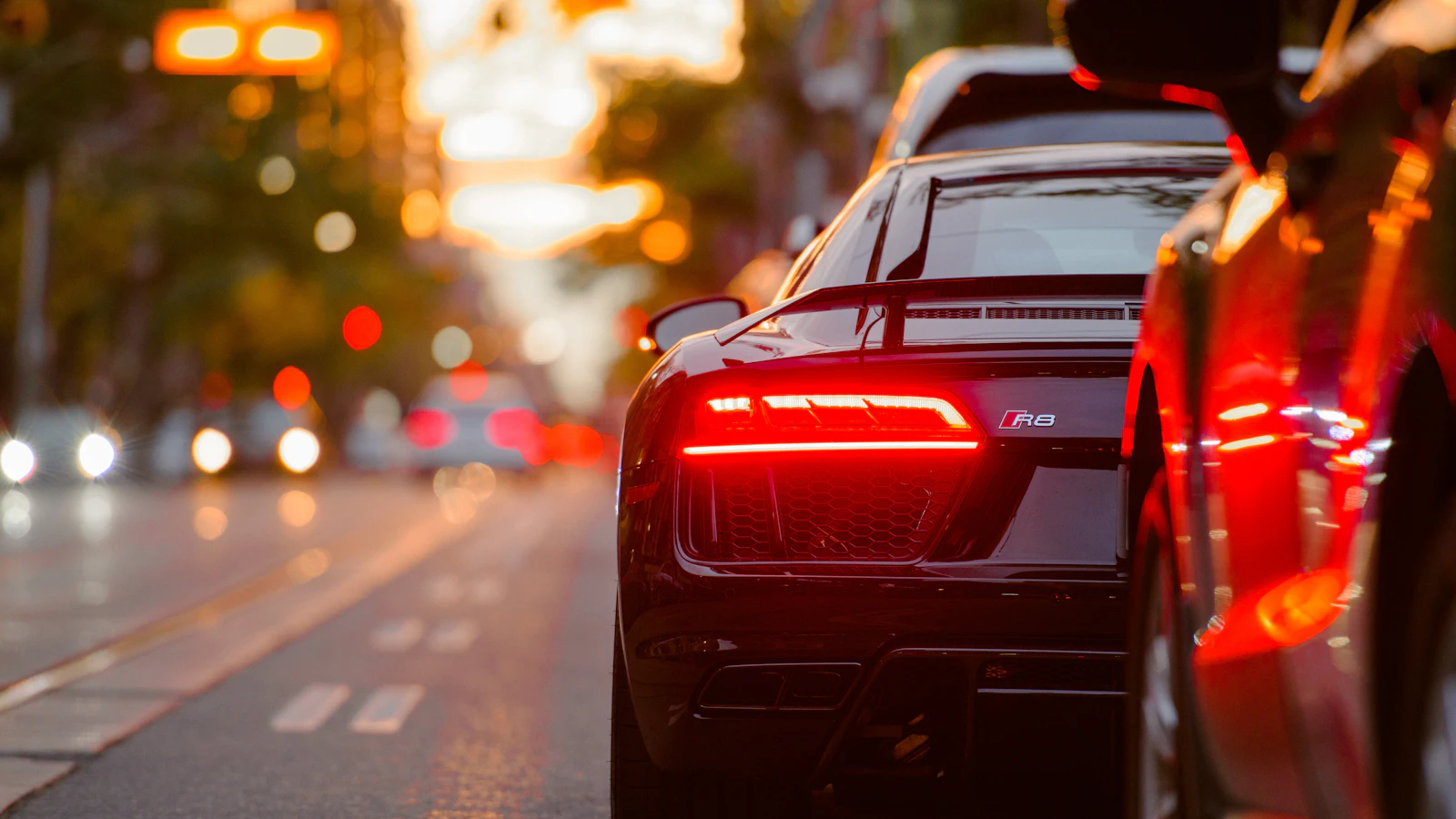 A professional mechanic working on a vehicle engine bay